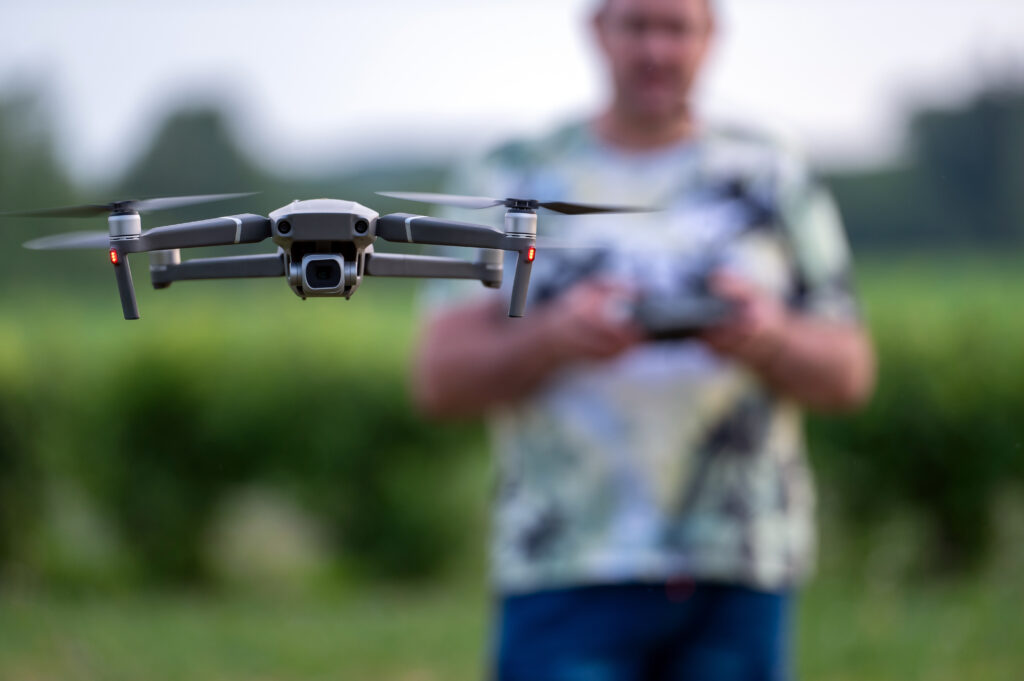 Individual Flying a Drone